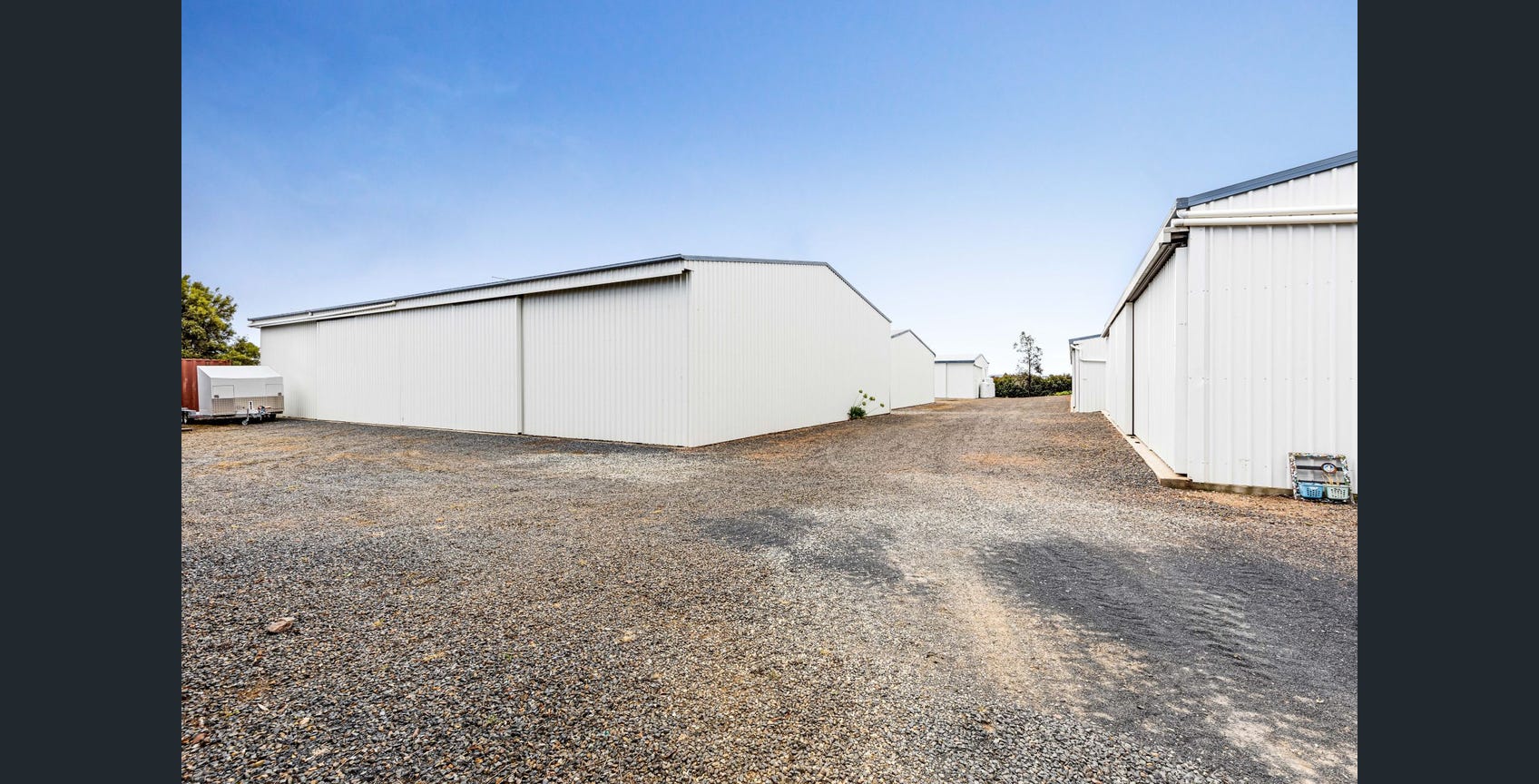 Storage sheds and gravel access area at Eastern Downs Storage and Stopover